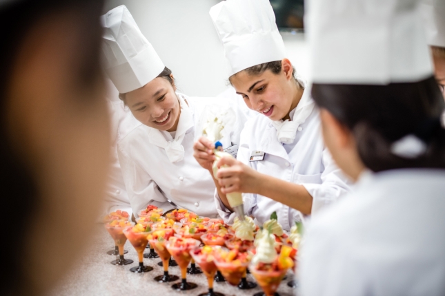 young students cooking
